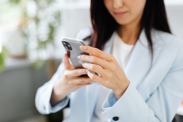 Man and woman chatting safely on a dating app in India
